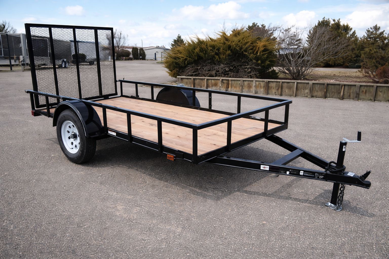 5' x 10' Carry-On Heavy-Duty Utility Trailer – Wood Floor Open Utility Trailer with 4-Foot Rear Mesh Ramp and 2,990 lb. GVWR